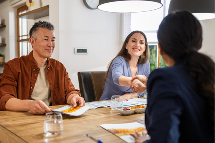 A couple meeting with a financial advisor